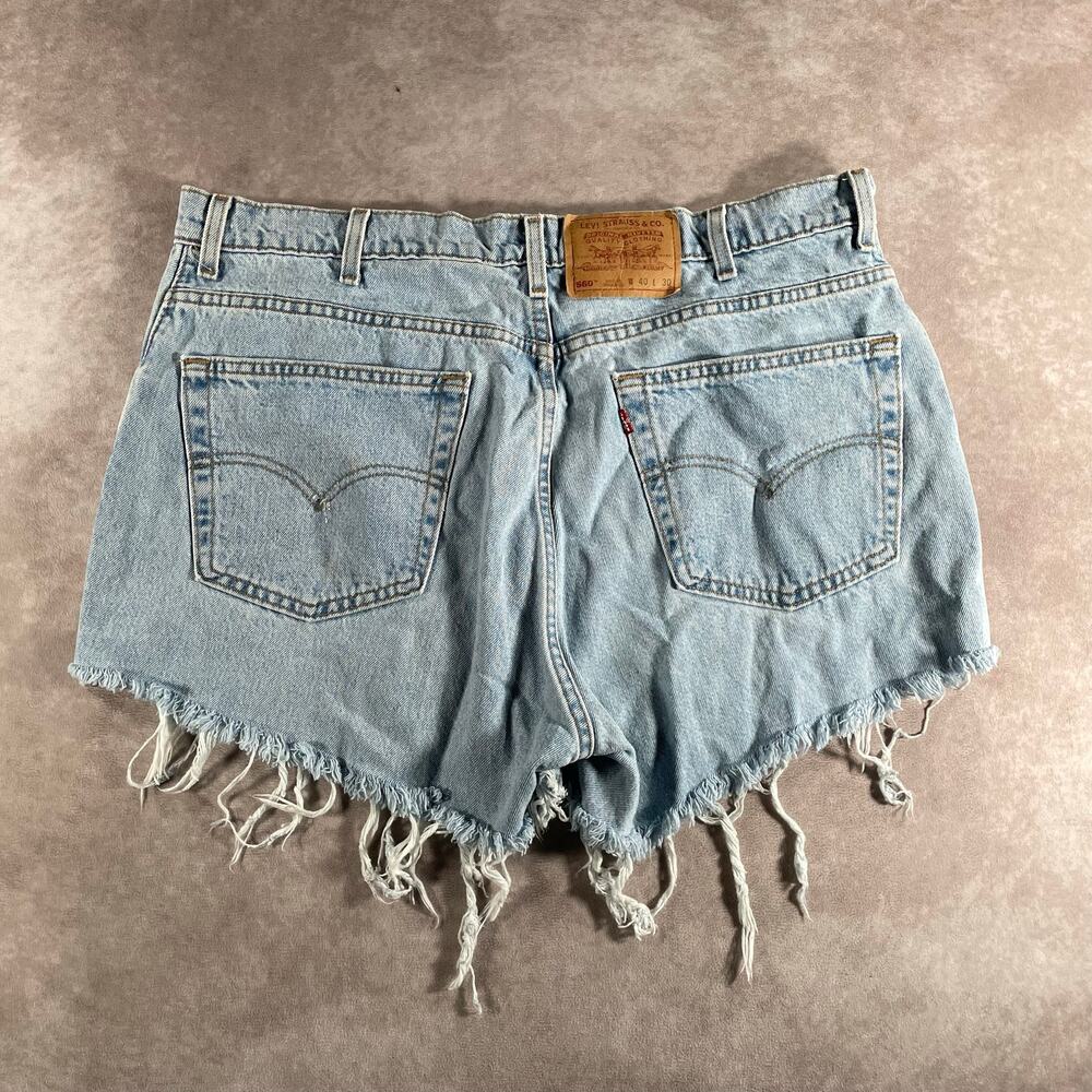 90’s Women’s Levi’s Cut Off Distressed Denim Shorts Waist 37 560 Light Wash